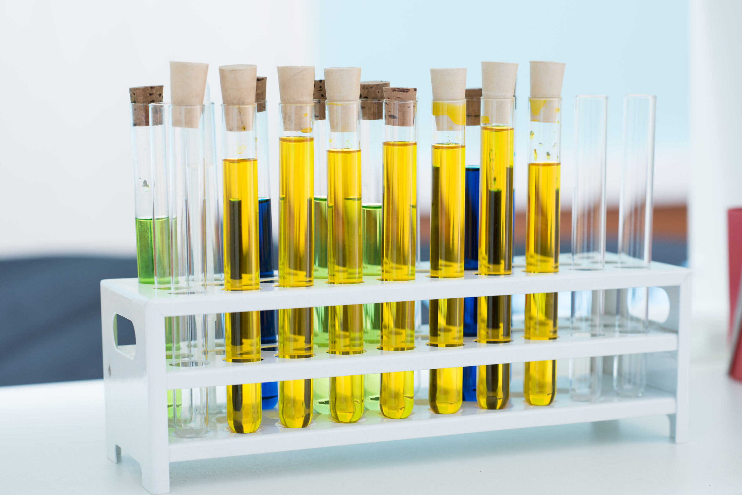 Close-up view of test tubes with colorful chemical samples in lab