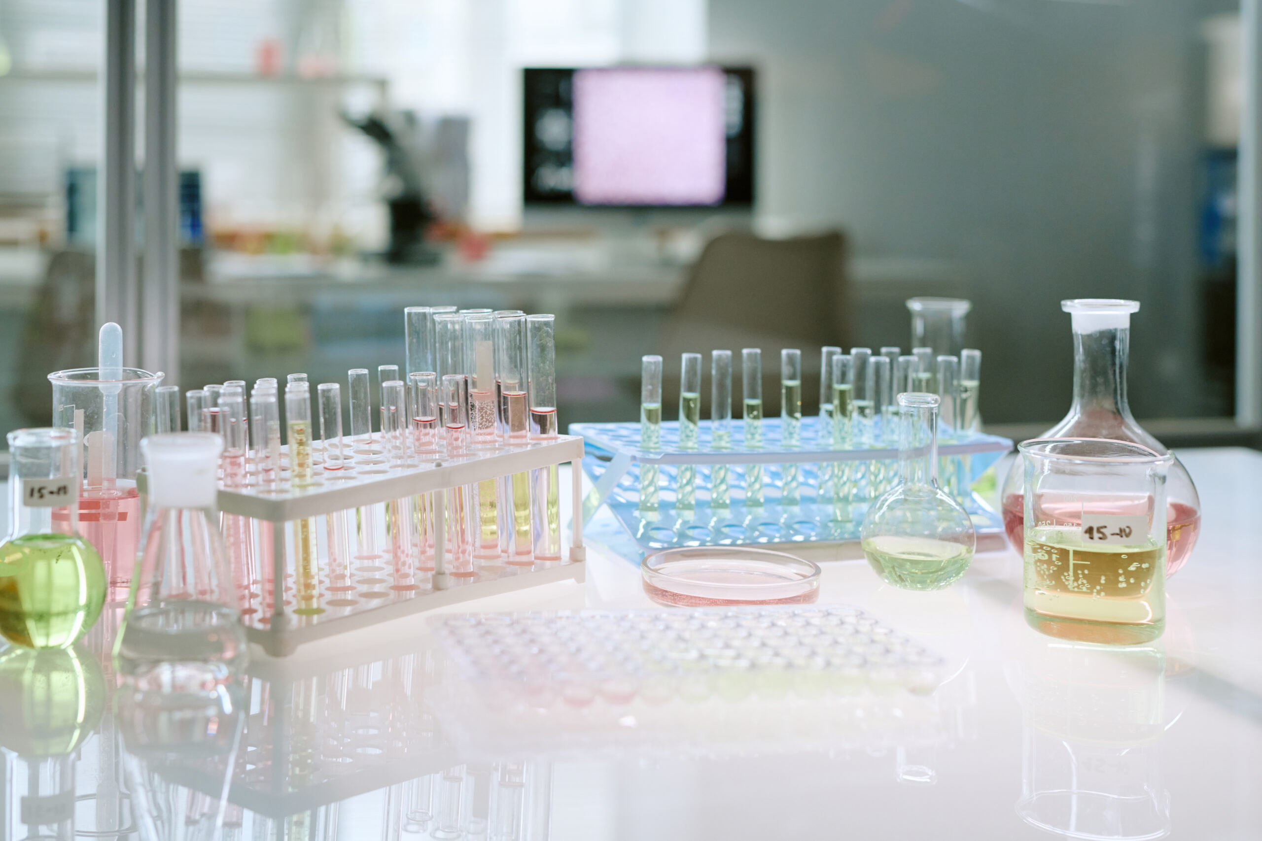 Laboratory Glassware Containing Chemical Solutions in Medical Research Setting